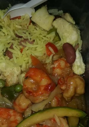A picture of Curry rice with prawn sauce.