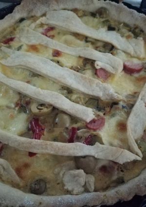 Una foto de Tarta de zapallitos y panchos