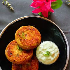 A picture of Chickpea Patties with Yought Dip.