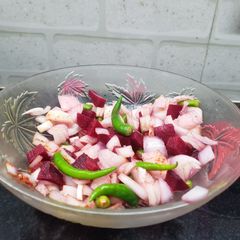 A picture of Beetroot onion and green chilli sirke wale salad.