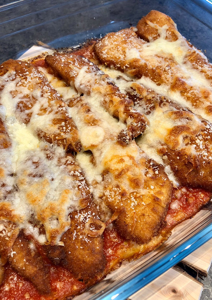 Una foto de Fingers de pollo al horno con mozzarella y parmesano