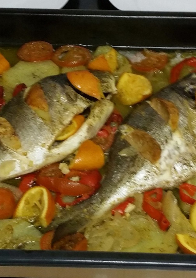 Una foto de Doradas al horno con salsa de naranja