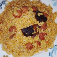 Jellof rice and sausage A picture of Jellof rice and sausage.