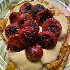 A picture of Cajun Ravioli and Sausage (With Cajun Bechamel Sauce).
