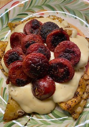 A picture of Cajun Ravioli and Sausage (With Cajun Bechamel Sauce).