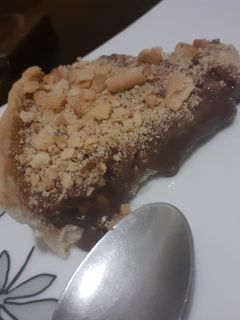 Una foto de Tarta de leche condensada, chocolate y galletas
