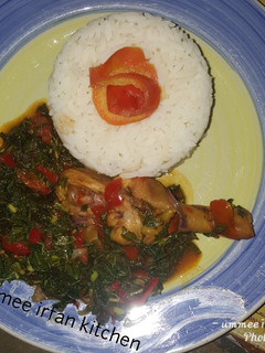 A picture of Rice wif vegetable soup.