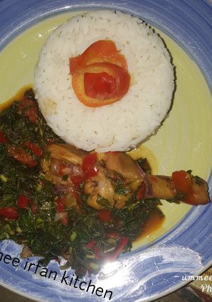 A picture of Rice wif vegetable soup.