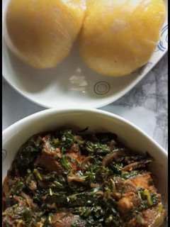 A picture of Eba with vegetable soup.