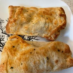 A picture of Air Fried Chicken Alfredo calzones.