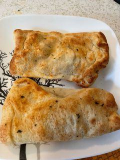 A picture of Air Fried Chicken Alfredo calzones.