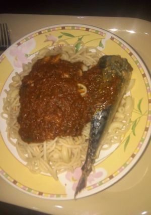 A picture of Spaghetti and fish stew.