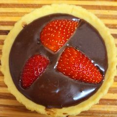 A picture of Chocolate tart with strawberry.
