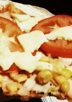 Una foto de Pizza con Maíz