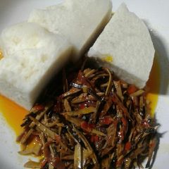 A picture of Yam with oil bean (ugba) sauce.