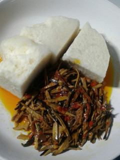 A picture of Yam with oil bean (ugba) sauce.