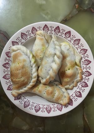 Una foto de Empanadas de carne cortada a cuchillo