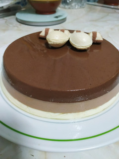 Una foto de Tarta tres chocolates