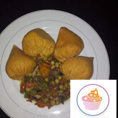 A picture of Moimoi with fish and vegetable soup.