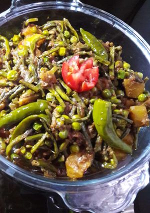 A picture of Freanch Beans and Aloo Mater Ki Sabzi.