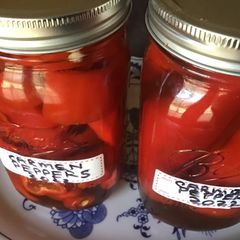 A picture of California Farm Pickled Mild Red Peppers.
