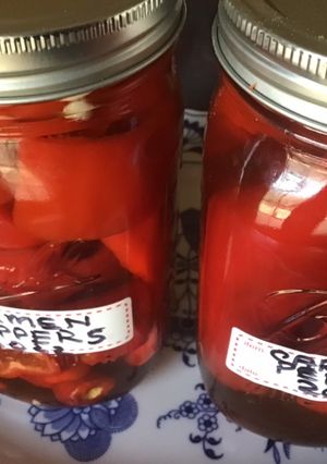 A picture of California Farm Pickled Mild Red Peppers.