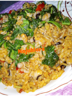 A picture of Palm oil jollof rice and beans.