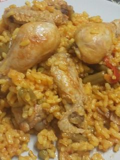 Una foto de Arroz y pollo