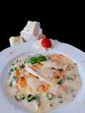 Piept de pui în sos quatro formaggi