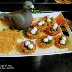 A picture of Aalu paneer Bird Nest.
