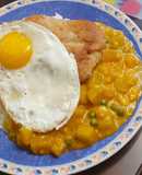 Locro de zapallo con milanesa y huevo frito