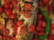 A picture of sardines in tomato