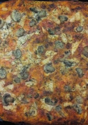 Una foto de Pizza de atún y champiñones