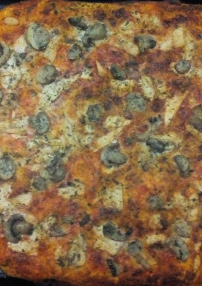 Una foto de Pizza de atún y champiñones