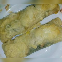 A picture of Spinach and ricotta crepes.