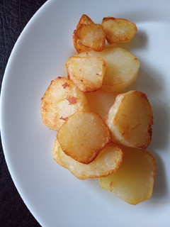 Una foto de Papas doradas