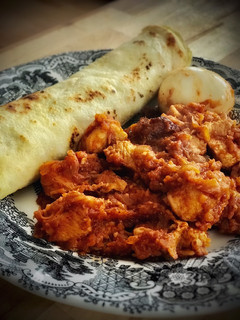 Una foto de Cena etíope: Doro Wat con Injera