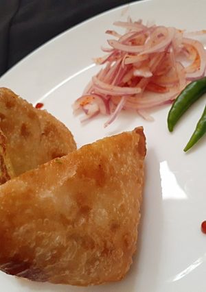 A picture of Kolkata style Mughlai Paratha.