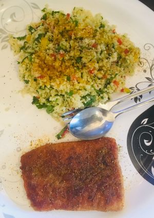 A picture of Couscous salad and Pan fried Salmon.