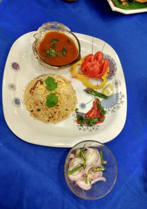A picture of Paneer Tikka veg chilli garlic rice with Rajma.