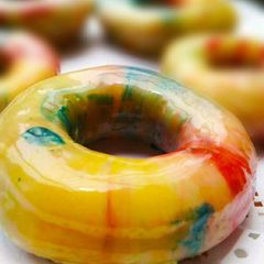 A picture of Baked Egg less Banana Chocolate Dipped Marble Doughnuts.