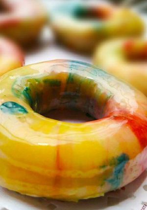 A picture of Baked Egg less Banana Chocolate Dipped Marble Doughnuts.