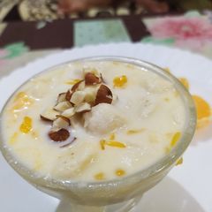 A picture of Orange Rasmalai/ Khatti Mitti Paneer Bahar.