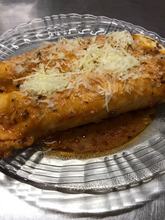 Una foto de Canelones de acelga y pollo