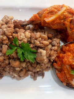 A picture of Beans with tomato sauce.