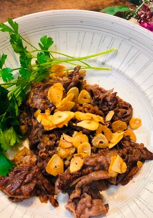 A picture of Japanese Wagyu Beef (fry with garlic and butter soy sauce).
