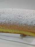 Brazo de gitano (o enrollado) relleno de crema pastelera