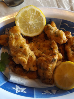 Una foto de Bacalao rebozado y frito