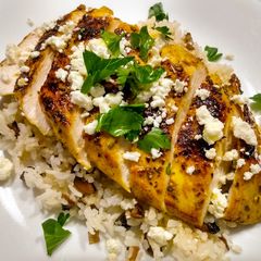 A picture of Pan-seared chicken with warm spices and feta.