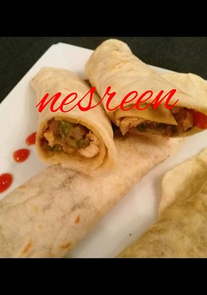 A picture of Chicken Shawarma Wraps with Tortilla Bread.